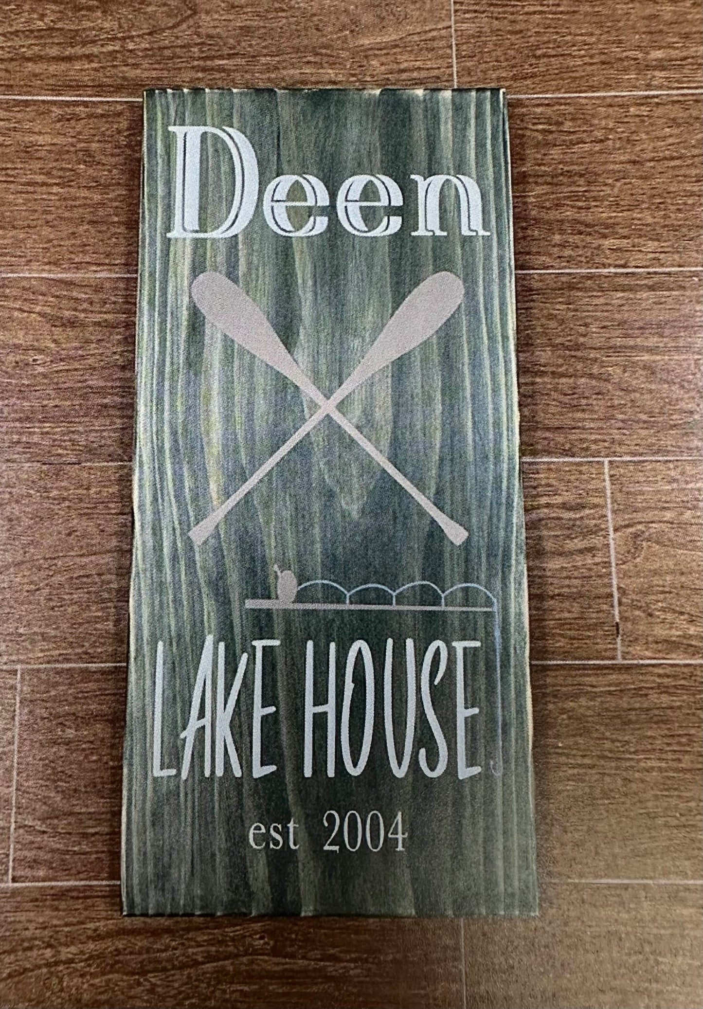 283 - Lake house with paddles and fishing pole